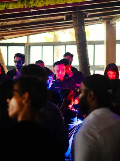 Another angle from the dancefloor, showing the mix of red and blue lights that created a dynamic and immersive atmosphere.