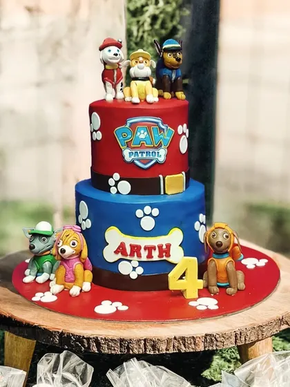 No job is too big, no pup is too small! This two-tier Paw Patrol cake is ready for action, featuring the whole team of heroic pups. It's one of my most requested designs for kids' birthday parties.