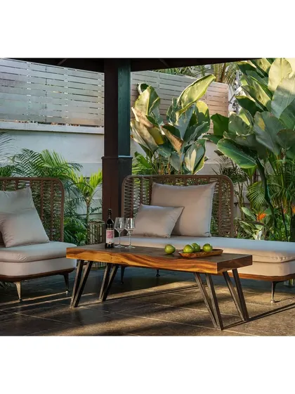 A close-up of the comfortable and stylish outdoor seating, perfect for enjoying a quiet evening.