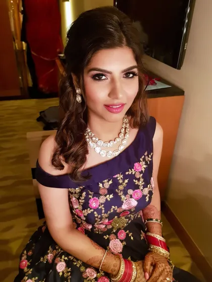 Another angle of this classic glam look, showing the beautifully blended eye makeup and contour.