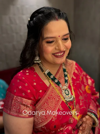A beautiful, subtle, and glowy makeup look for a naming ceremony. She looks absolutely radiant and happy.
