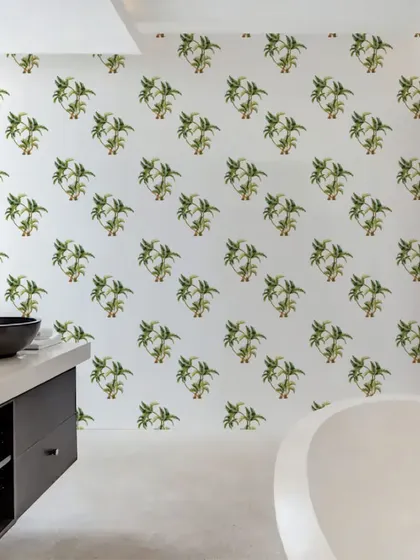 Our Group of Palm Trees wall stickers add a clean and modern tropical touch to this bathroom. The pattern is a great way to add interest to a minimalist space.