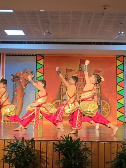 Another angle of the student performance, highlighting their powerful stances and synchronized movements.