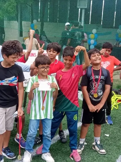 That winning feeling! After an epic football tournament, it's all smiles and celebrations. We make sure every child feels like an MVP with fun competitions and awards that boost their confidence.