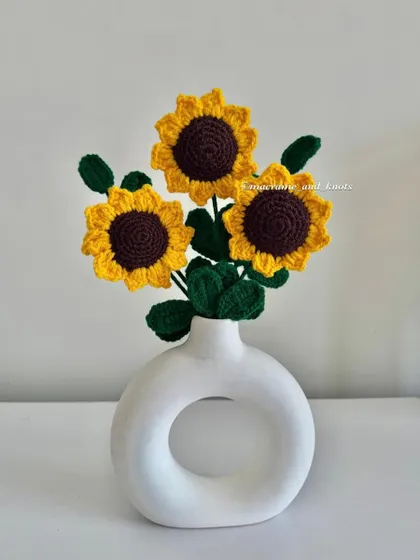 A trio of crochet sunflowers, a perfect little bouquet to brighten any space.