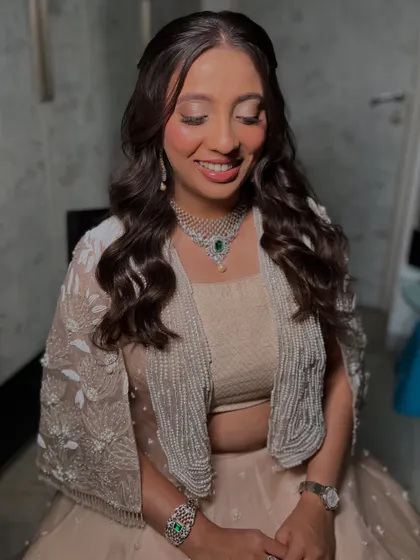 Engagement ready with skin like silk and eyes that steal hearts. This bride's soft glam look, with shimmery lids and a dewy complexion, is pure elegance.