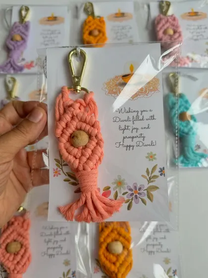 This peach-colored macrame keychain was part of a custom Diwali gift set. The warm color is so inviting and perfect for the festive season.