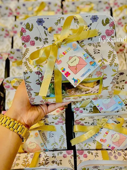 Another angle of the floral baby shower hamper, showing the beautiful gift wrapping and attention to detail.