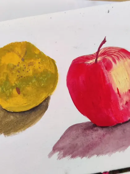 A still life study of an apple and an orange, painted from life using gouache. This was great practice for capturing light, shadow, and form.