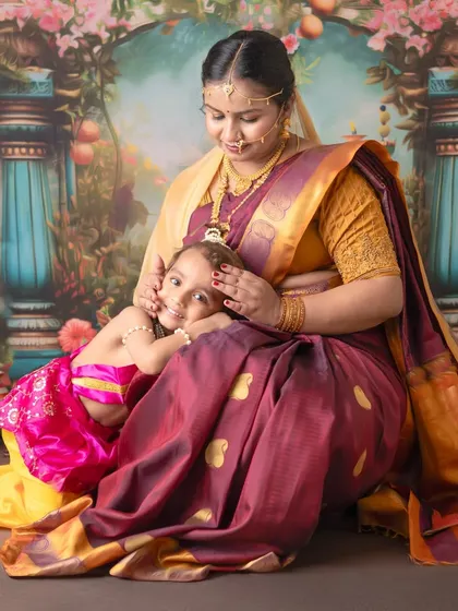 A quiet, loving moment as Yashoda cradles her little one. These portraits focus on the serene and gentle side of this divine mother-child relationship.