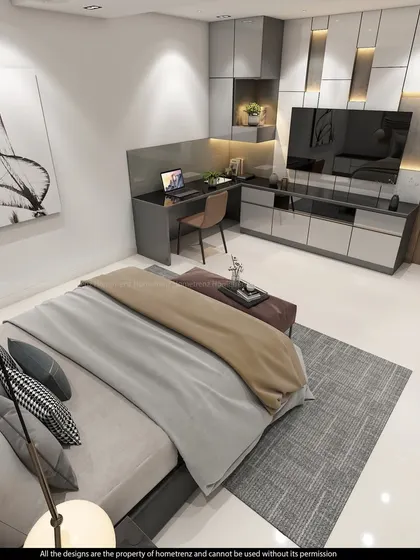 A master bedroom with a sleek, modern TV unit and desk combination. The wall is paneled with vertical, back-lit sections for a futuristic look.