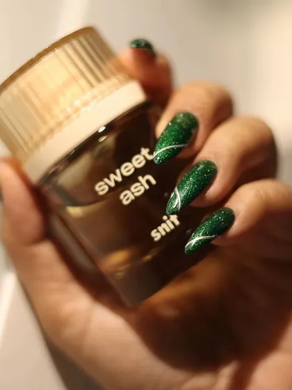 We love how this green glitter polish sparkles in the light.