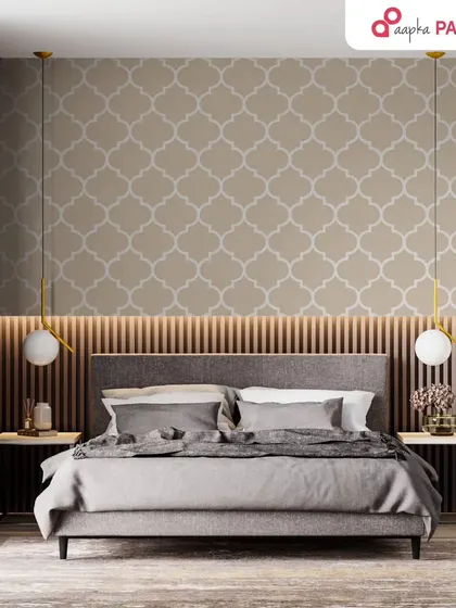 This bedroom features a sophisticated accent wall with a Moroccan tile stencil pattern. Paired with modern lighting and a neutral palette, it creates a chic and stylish look.