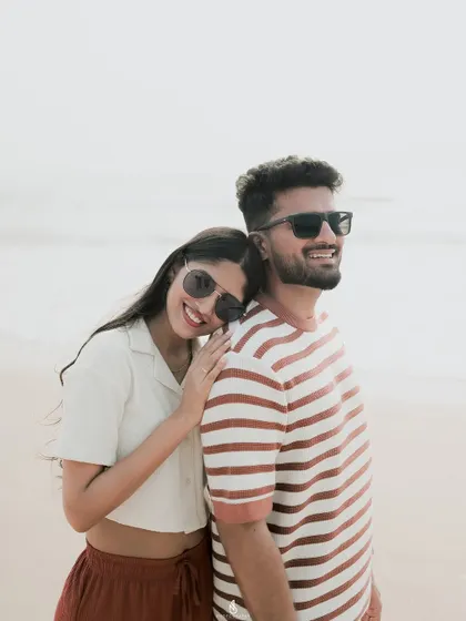 A sweet and candid moment of affection. My focus is on capturing the real love and friendship between partners during their engagement photoshoot.