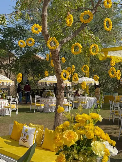 A classic Haldi ceremony, drenched in sunshine and happiness. We used traditional marigolds and custom block-printed umbrellas to create a joyful, open-air celebration in a beautiful garden setting.