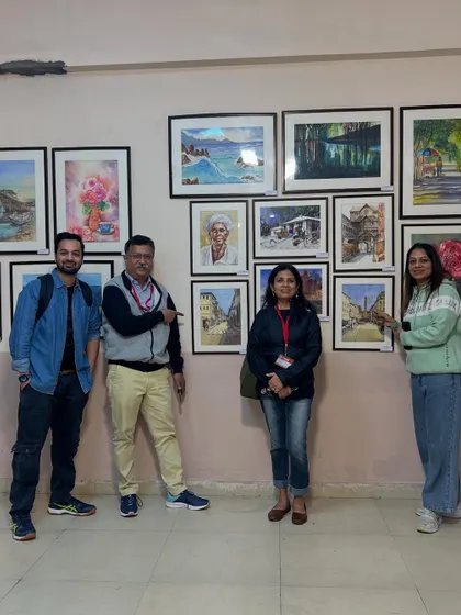 Posing with friends in front of our displayed works at the IWS festival. The art community is so supportive and it was a joy to share this experience.