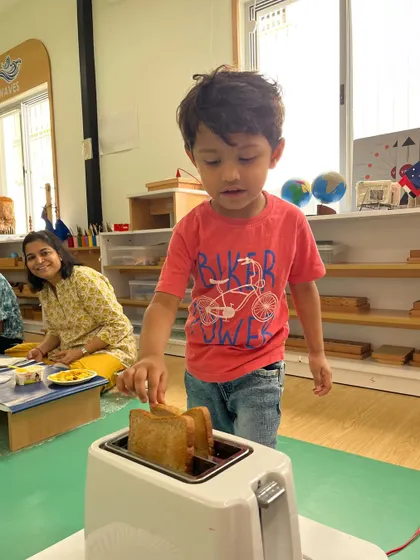 Each activity, from making Bhel Puri and toast to plucking methi leaves and exploring what floats, is a lesson in itself. These practical life and sensorial activities are central to the Montessori method, helping children develop fine motor skills, concentration, and a deep understanding of the world through their own actions.