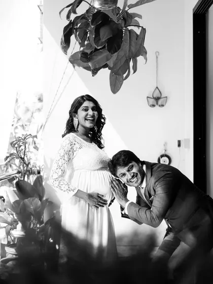 A duplicate of image 30, this playful black and white shot highlights the happy anticipation of the parents-to-be.