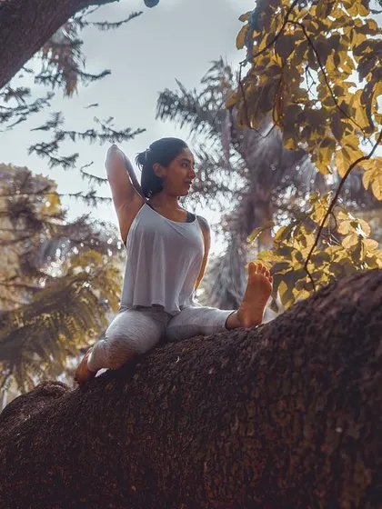 Finding a moment of peace in Gomukhasana, or Cow Face Pose arms, while perched on a tree. This is a great stretch for the shoulders and a reminder to let go and just be one with your breath.