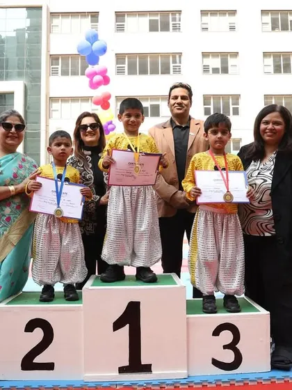A proud moment for our young champions as they receive their medals on the winner's podium at Khelchakra, celebrated by our staff and their families.
