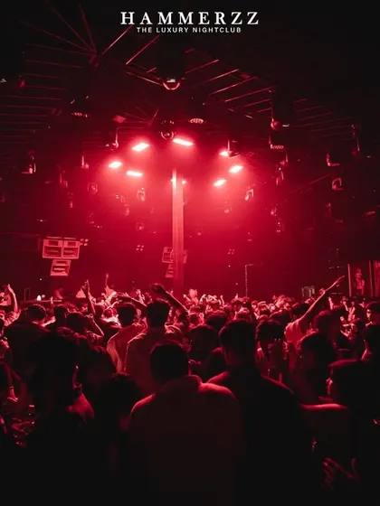 The entire club bathed in red light at Hammerzz. The mood is intense.
