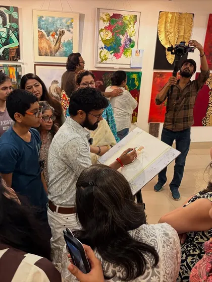 The demonstration in full swing, with artists and enthusiasts capturing the moment on their phones and cameras.