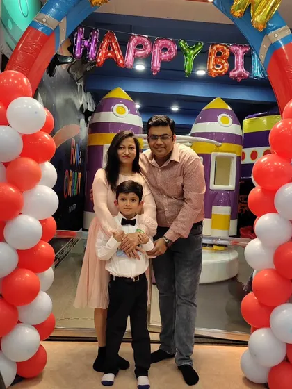 A lovely family photo in front of a birthday balloon arch. I provide plenty of great photo opportunities throughout the venue.