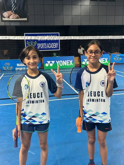 The successful U11 doubles pair, Arshiya and Samaira, on the court after securing their bronze medal at the state championship.