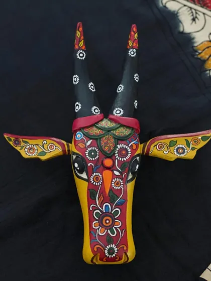 This shot captures the playful yet traditional feel of the Kalamkari Nandi, a piece that bridges folk art with contemporary decor.