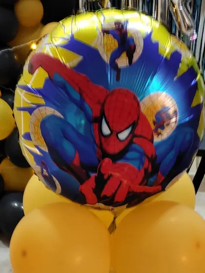 A detail of the smaller, round Spiderman foil balloon used as an accent in the balloon pillars.