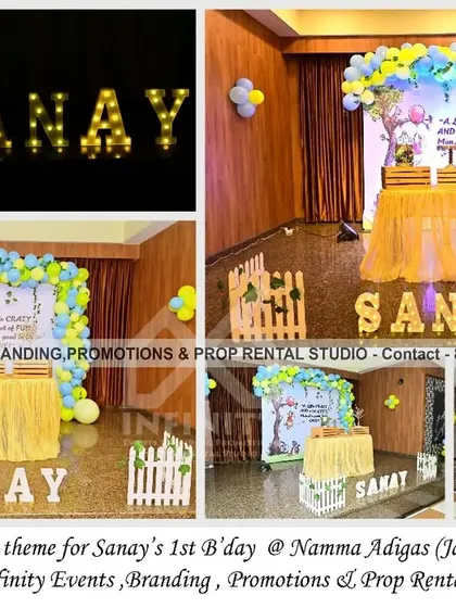 A classic Winnie the Pooh theme for a first birthday at Namma Adigas. The simple and elegant setup features a character backdrop, a yellow and blue balloon arch, and a skirted table, bringing the charm of the Hundred Acre Wood to the party.