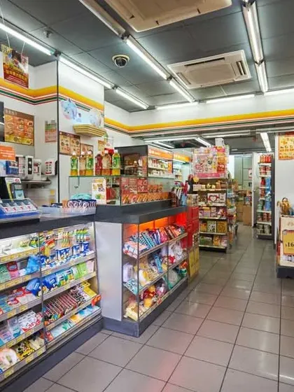 The checkout counter and front-of-store area, designed for quick transactions and to display impulse-buy items effectively.