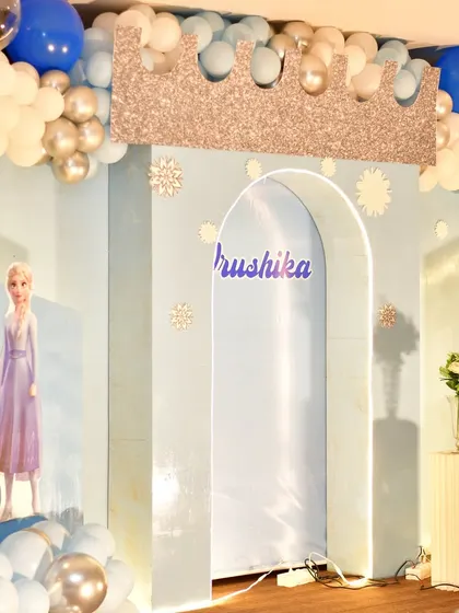 Detail of the Frozen backdrop, showing the custom-cut crown and snowflake accents.