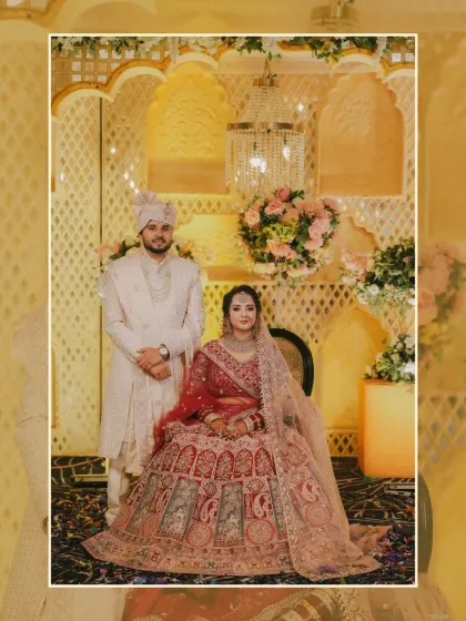 A formal portrait of the couple seated and standing, exuding grace and elegance. The golden decor and floral arrangements add a touch of royalty.