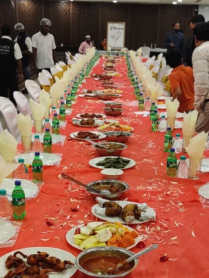A wide view of our staff serving guests at a packed wedding hall. We are experienced in managing large crowds efficiently, ensuring everyone is served promptly.