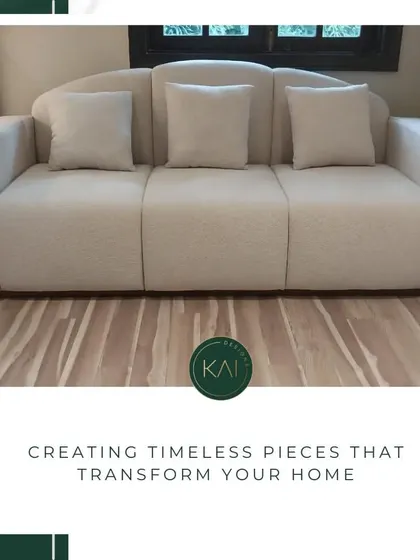 A three-seater sofa with a curved back and individual seat cushions, designed for ergonomic comfort and a soft, inviting look. The neutral fabric and simple form make it adaptable to various interior styles.