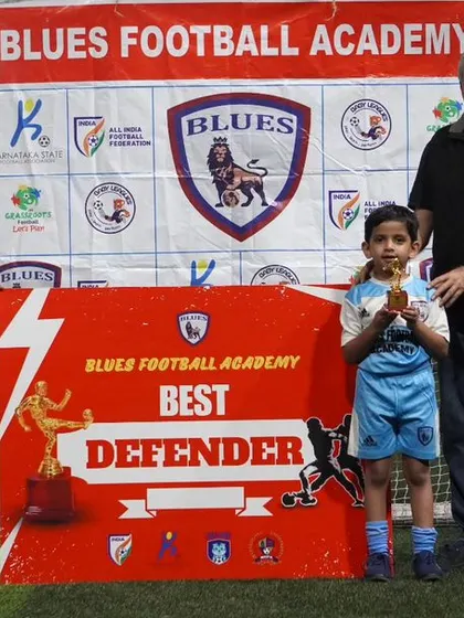 This little one earned the "Best Defender" award for his solid play. It's wonderful to see such young players mastering key positions.