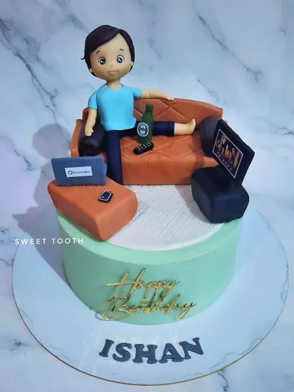 The lazy boy cake, again! This chocolate truffle cake is for Ishan, who loves to relax on the couch with his gadgets and a beer.