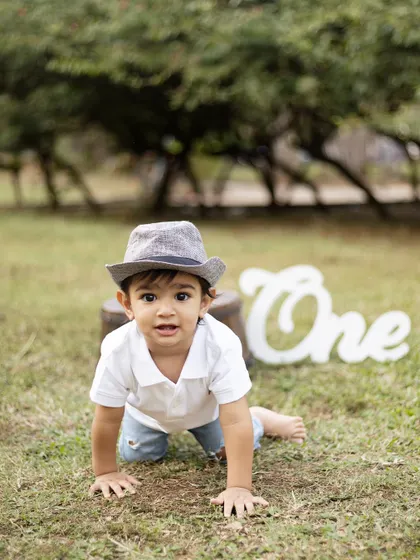 Another crawling action shot, capturing his determination and curiosity as he explores the park.