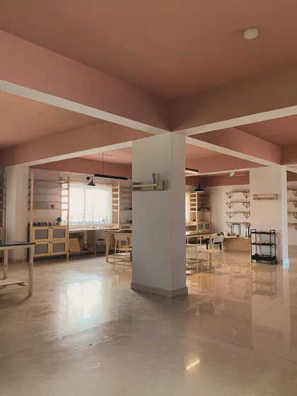 The studio is a collection of different zones. This view shows how the workspaces flow into each other, creating a sense of shared energy while still allowing for individual focus.