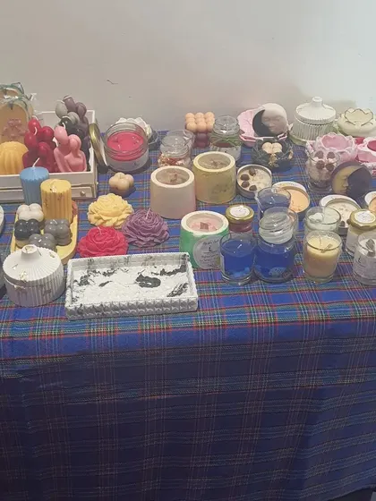 This is a snapshot of my stall at a local event, showcasing the variety of products I create. You can see my handmade candles, soaps, and cosmetics, all available for your custom hampers.