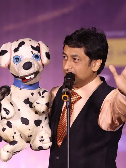 Performing with my Dalmatian puppet for the bright engineering students at NIT Trichy. Each puppet brings a different flavor of comedy to the show.
