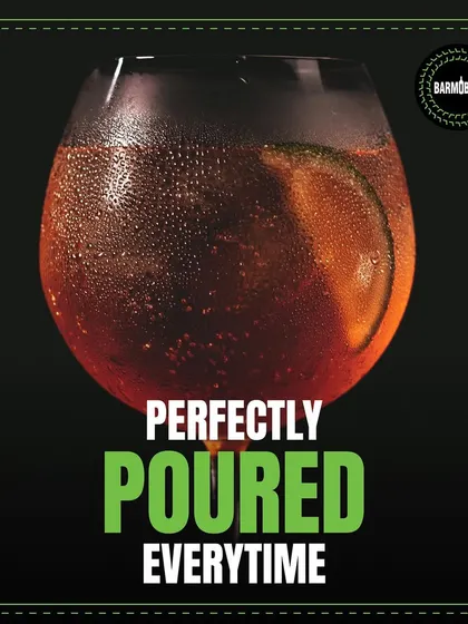 A perfectly poured dark and stormy with a lime wedge, condensation frosting the glass. We ensure every drink is served chilled and perfectly presented.