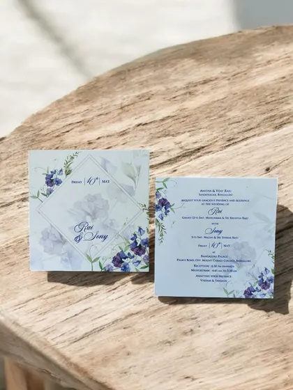 This beautiful single-insert card with a purple floral design, providing an elegant and affordable option for any occasion.