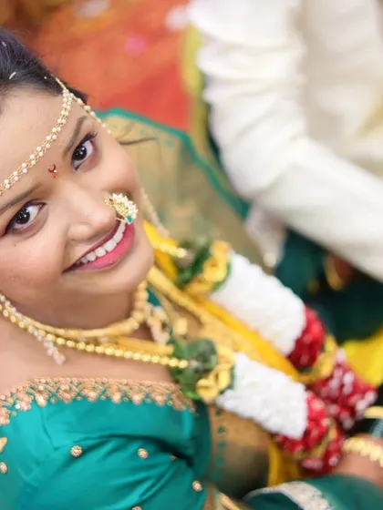 The pure joy on my bride's face. This candid shot captures her happiness during the wedding ceremony.