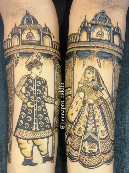 A close-up of the full-length bride and groom portraits. This highlights the intricate details in their outfits and the majestic palace architecture in the background, a truly regal design.