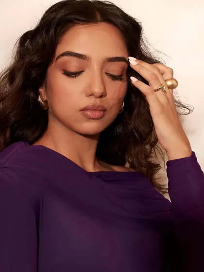 A close-up beauty shot from the Elle India editorial, capturing a soft and pensive mood.