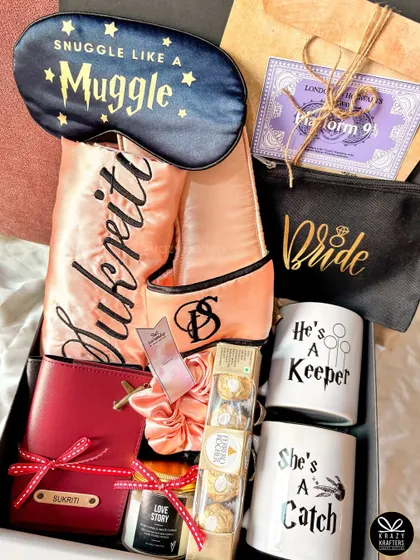 For the bride who's a Potterhead! This magical hamper includes "He's a Keeper" and "She's a Catch" mugs, a personalized robe, and a Platform 9 3/4 ticket.