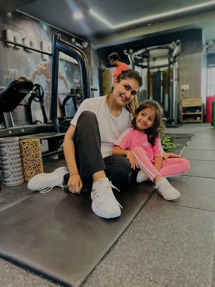 A quiet moment with my workout partner after a session. Making fitness a family affair creates lasting healthy habits.