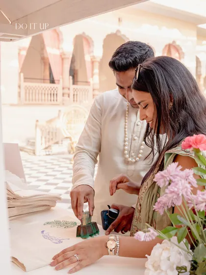 A guest activity station for block printing, allowing everyone to engage with a local Rajasthani art form. These interactive elements make the celebration more engaging and personal.